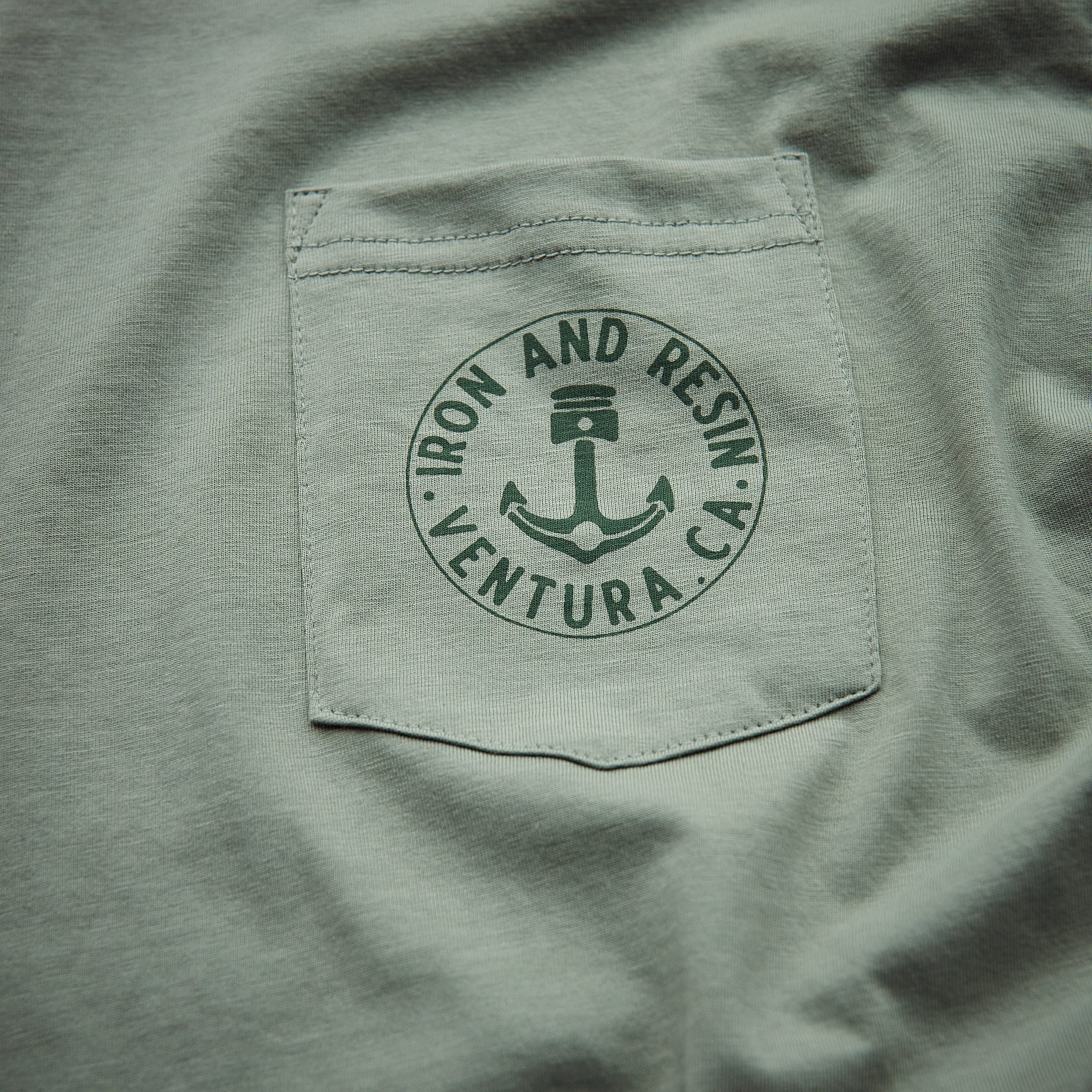 Iron & Resin - Brand Button Pocket tee green